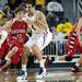 Saginaw Valley State Brett Beland drives against Michigan freshman Mitch McGary on Monday. Daniel Brenner I AnnArbor.com